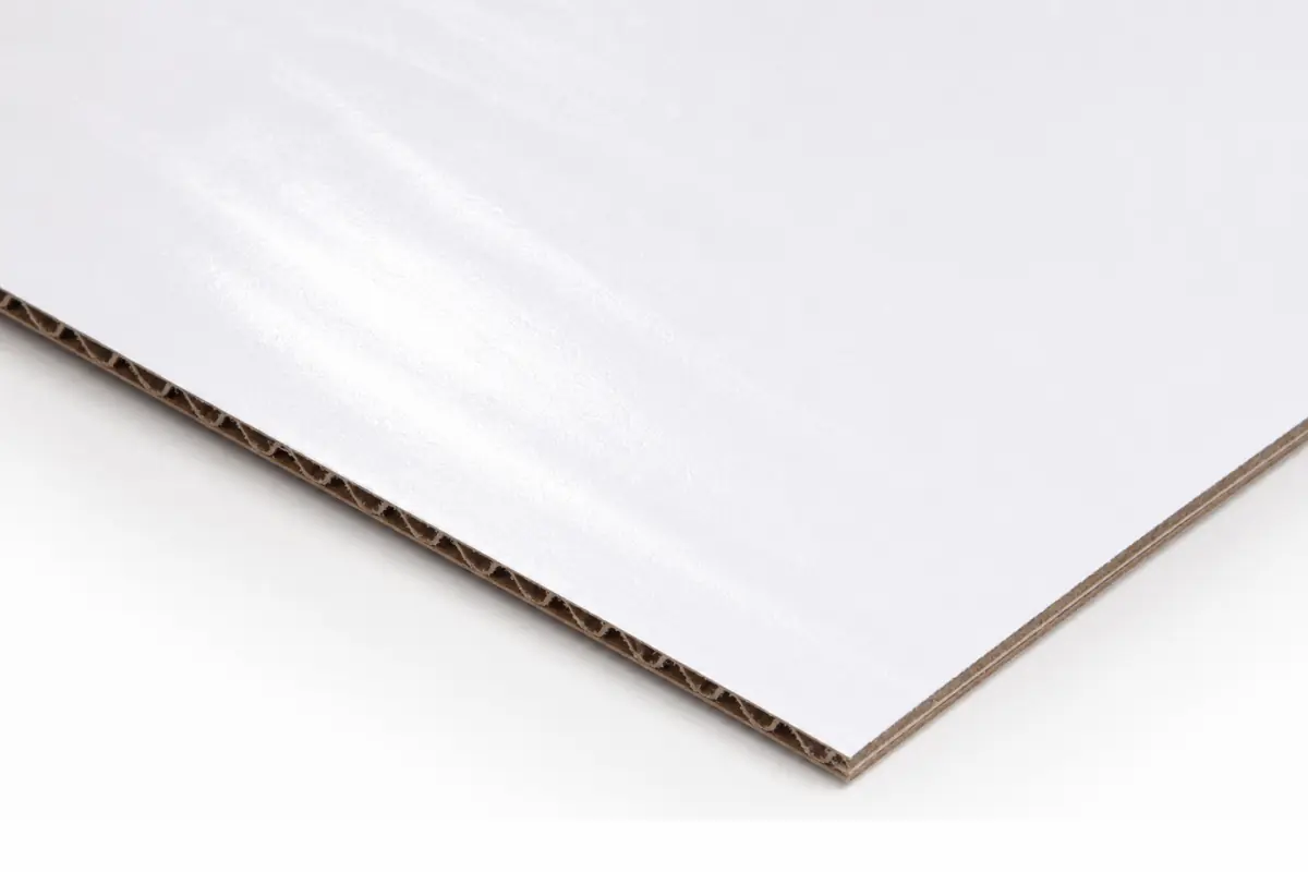 Kemi white corrugated board sheet with a bright coated liner for high-quality packaging print.
