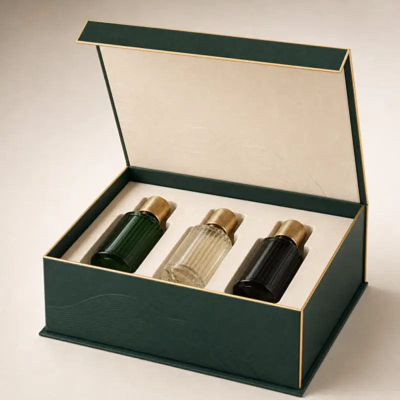 Open dark green partial-cover-lid rigid box with a fitted insert holding three perfume bottles.