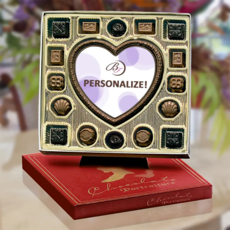 Custom chocolate packaging with a heart-shaped display window and personalized design.