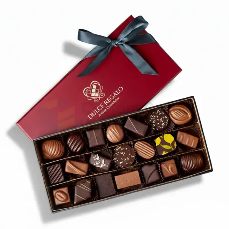 Red custom chocolate packaging box with black ribbon and premium assorted chocolates.