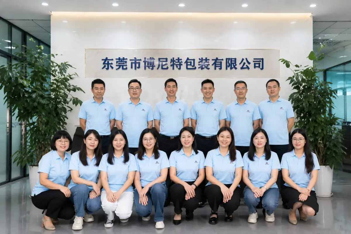 Bonito Packaging team group photo at the company office and custom box manufacturing business.